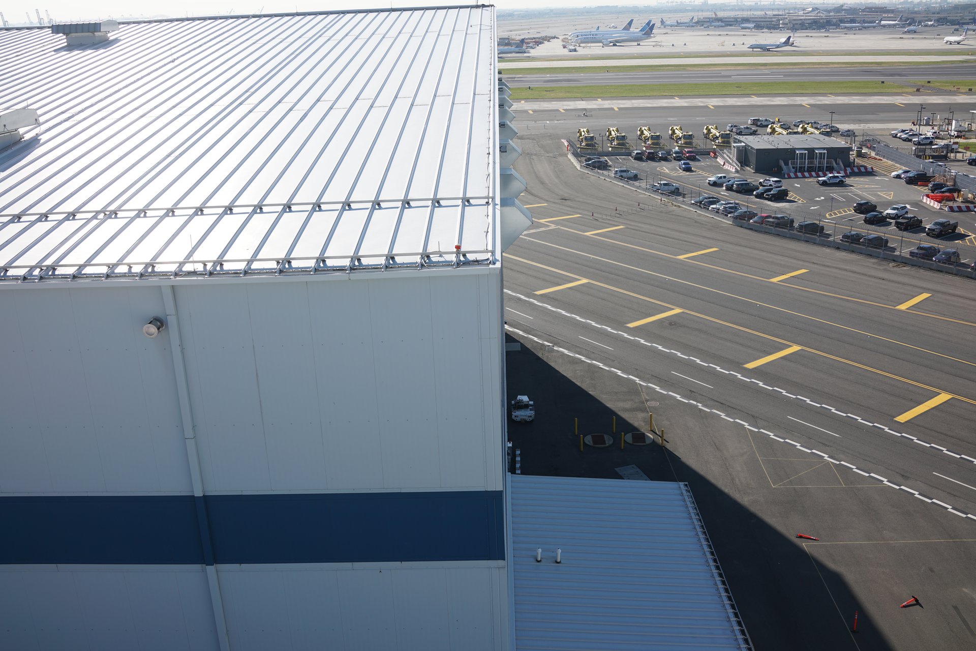 Drone view of Newark Airport terminal roof and tarmac area, New Jersey